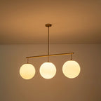Suspension moderne à 3 lumières en verre doré linéaire avec globe et bulles pour îlot de cuisine