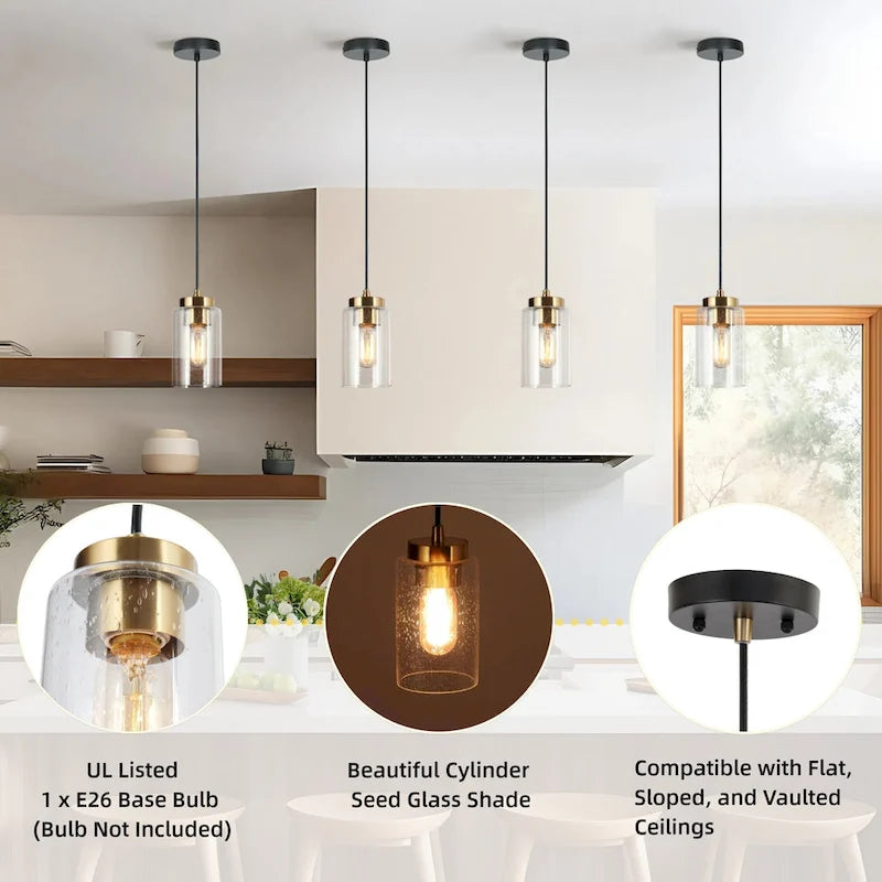 Suspension cylindrique moderne noire et dorée à une lumière en verre bullé pour cuisine ou salle à manger, idéale pour un îlot de cuisine.