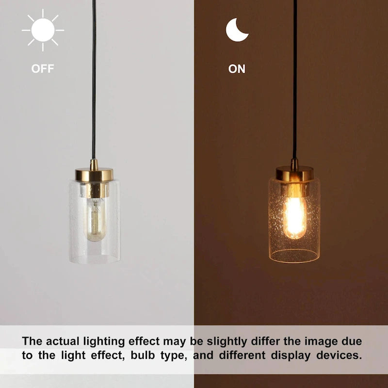 Suspension cylindrique moderne noire et dorée à une lumière en verre bullé pour cuisine ou salle à manger, idéale pour un îlot de cuisine.