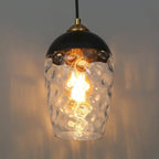 Suspension moderne et contemporaine à une lumière en verre martelé noir et or pour îlot de cuisine