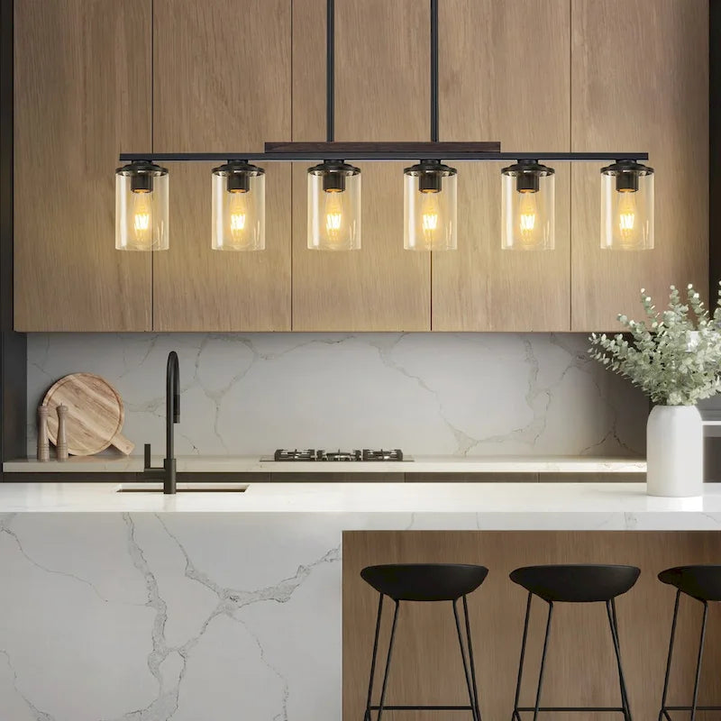 Lustre linéaire Starsky à 6 lumières, style ferme moderne, avec abat-jour cylindrique en verre, idéal pour îlot de cuisine.