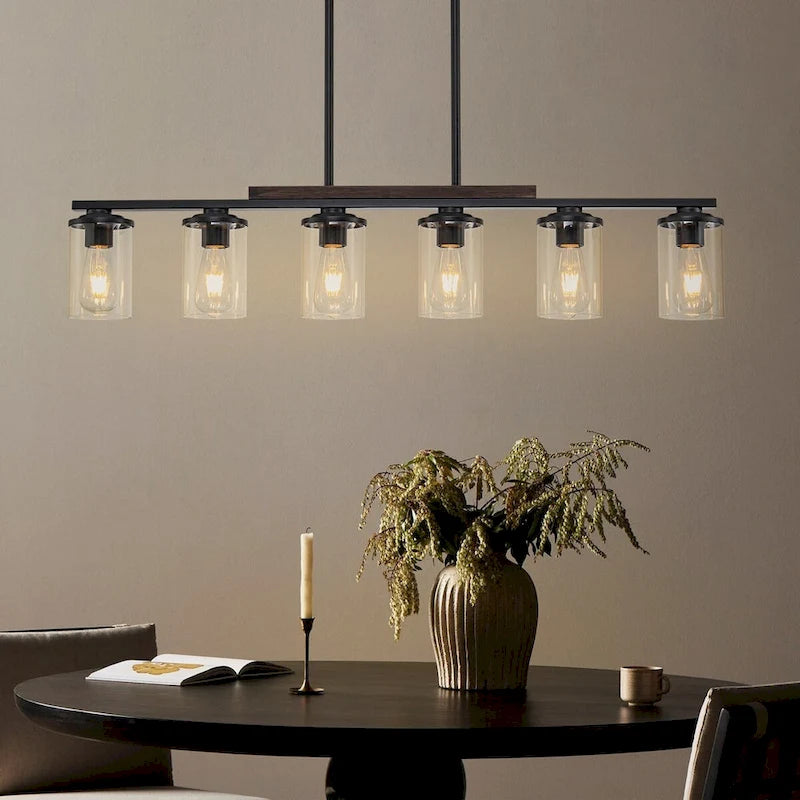 Lustre linéaire Starsky à 6 lumières, style ferme moderne, avec abat-jour cylindrique en verre, idéal pour îlot de cuisine.