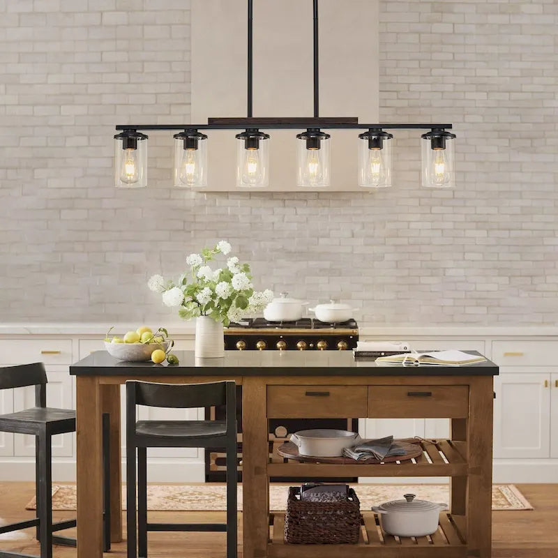 Lustre linéaire Starsky à 6 lumières, style ferme moderne, avec abat-jour cylindrique en verre, idéal pour îlot de cuisine.